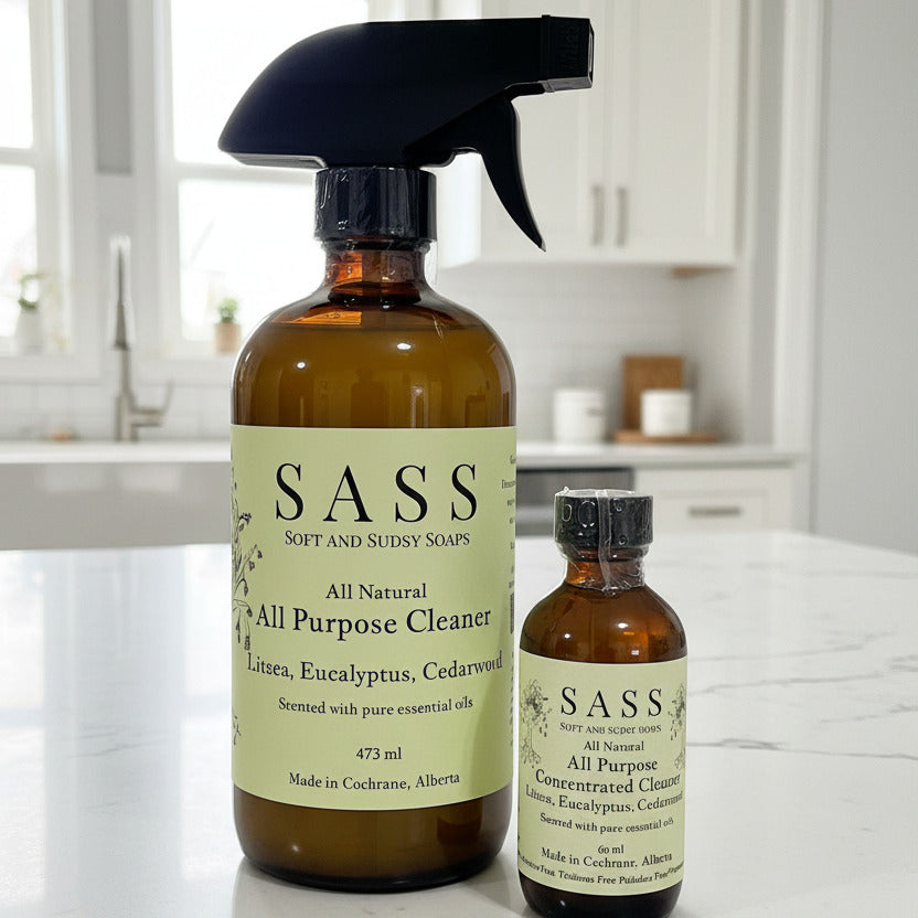 Two bottles of SASS all natural cleaning products on a kitchen surface. made in canada, all natural, non toxic