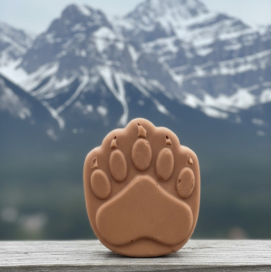 Brown paw print on a white background