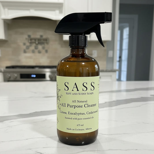 Bottle of SASS all natural all-purpose cleaner on a kitchen counter made in canada