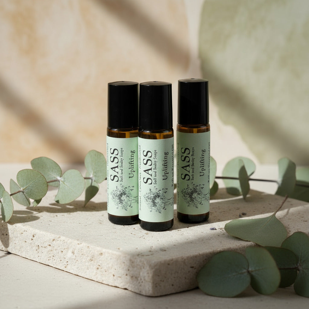 3 bottles of uplifting perfume roller balls